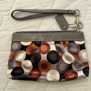 Brown and Grey Coach Wristlet